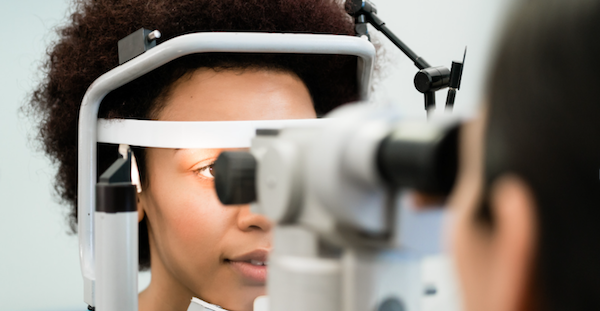 Woman getting eyes checked