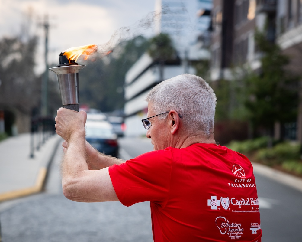 Gary holding torch